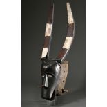 Guro buffalo mask, "Glo" or "Zewe" mask, West Africa/ Ivory Coast, 1st half 20th c., wood, traces o