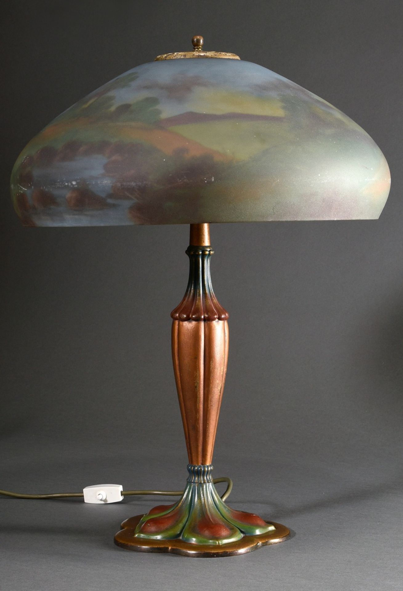 Art Nouveau table lamp with coloured cast zinc base and frosted glass shade painted on the inside "