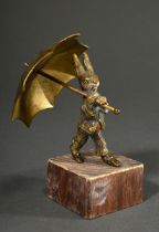 Bronze "Hase mit Schirm", bekleidet mit Wams und Hose, Reste farbiger Bemalung, auf Holzsockel, H.