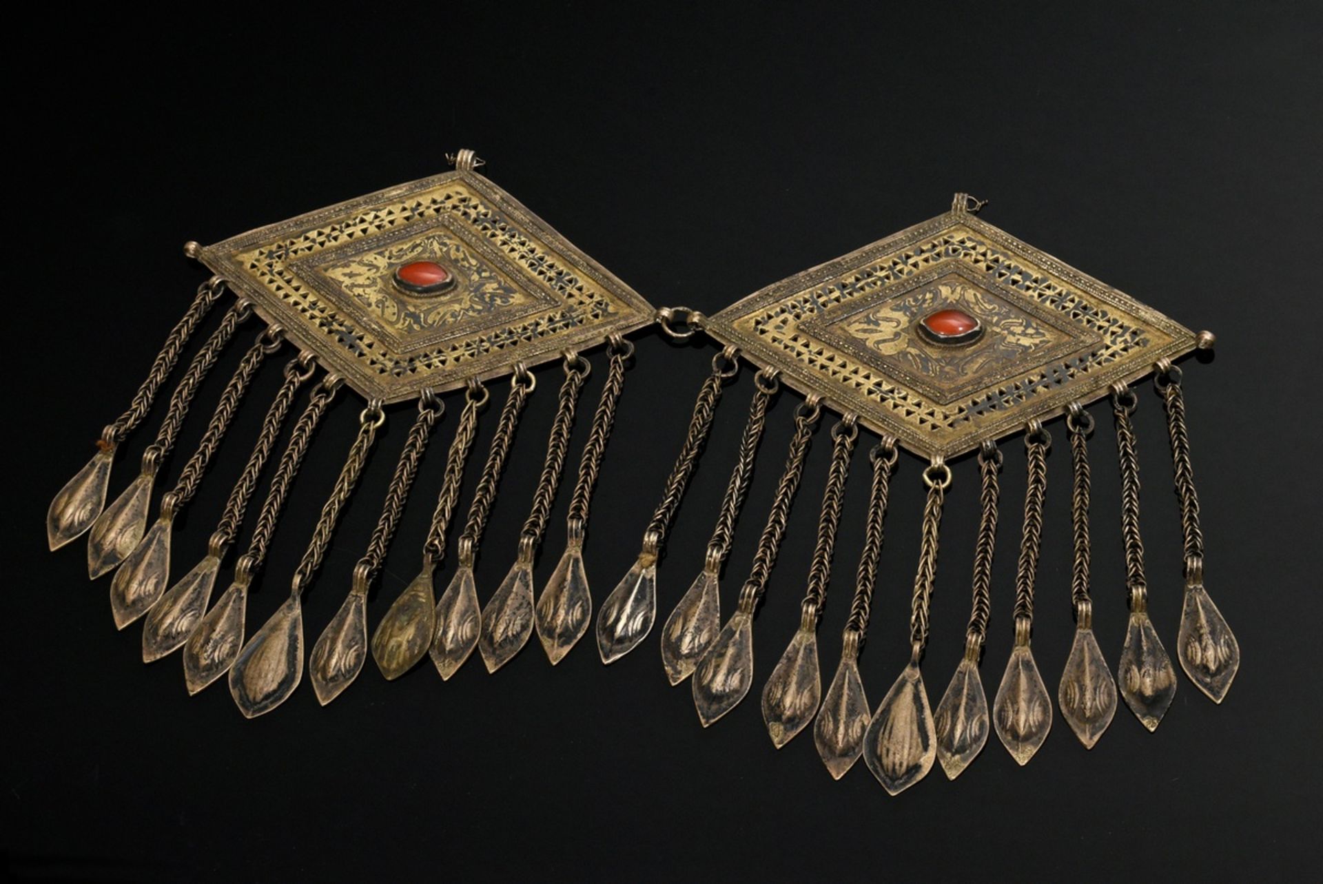 Tekke Turkmen coat clasp "Tschapraz" of diamond-shaped, open-worked and vegetal fire-gilt discs set
