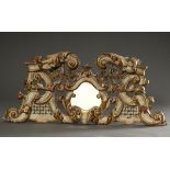 Elaborately carved and finely pierced supraport with volutes, garlands of flowers, latticework and 