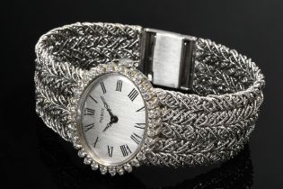 Weißgold 750 Tissot Armbanduhr mit Brillant Kranz (zus. ca. 0.95ct/VSI/W) um silberfarbenes Zifferb