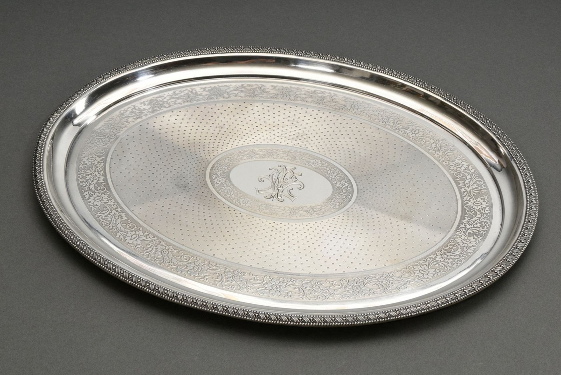 Oval Historicism tray with guilloché decoration between floral friezes and geometric relief rim, ce