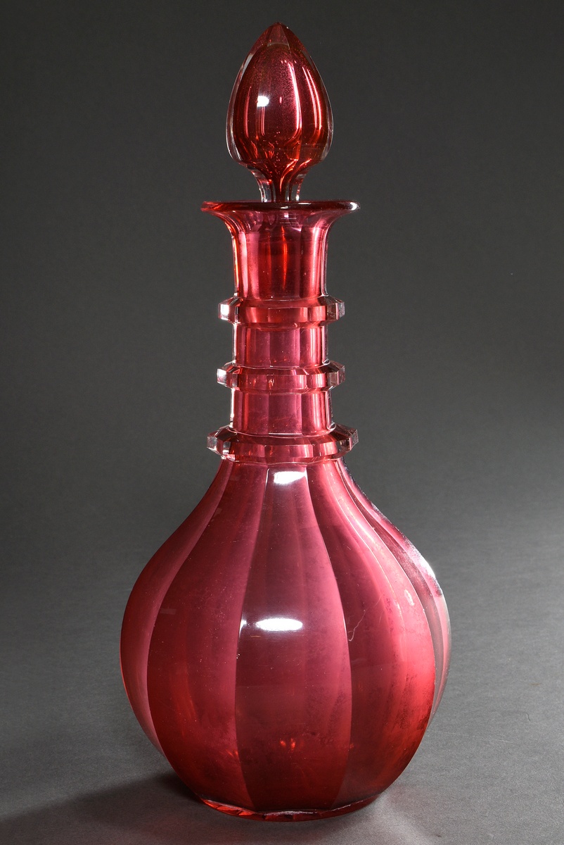 Biedermeier rosalin glass carafe with faceted body and 3 rings on the neck, cut star in the bottom,