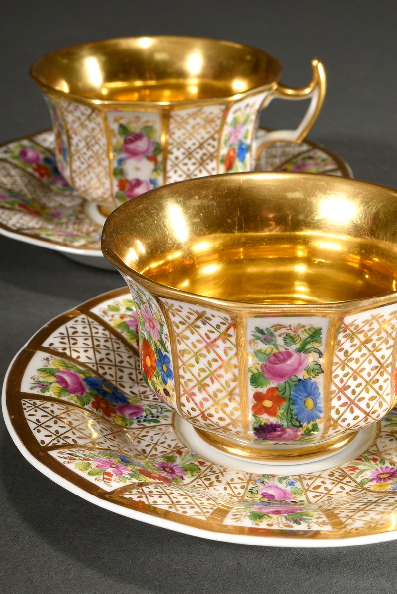 Pair of Biedermeier coffee cups/saucers with rich floral and gold decoration, Krister Porzellan Man
