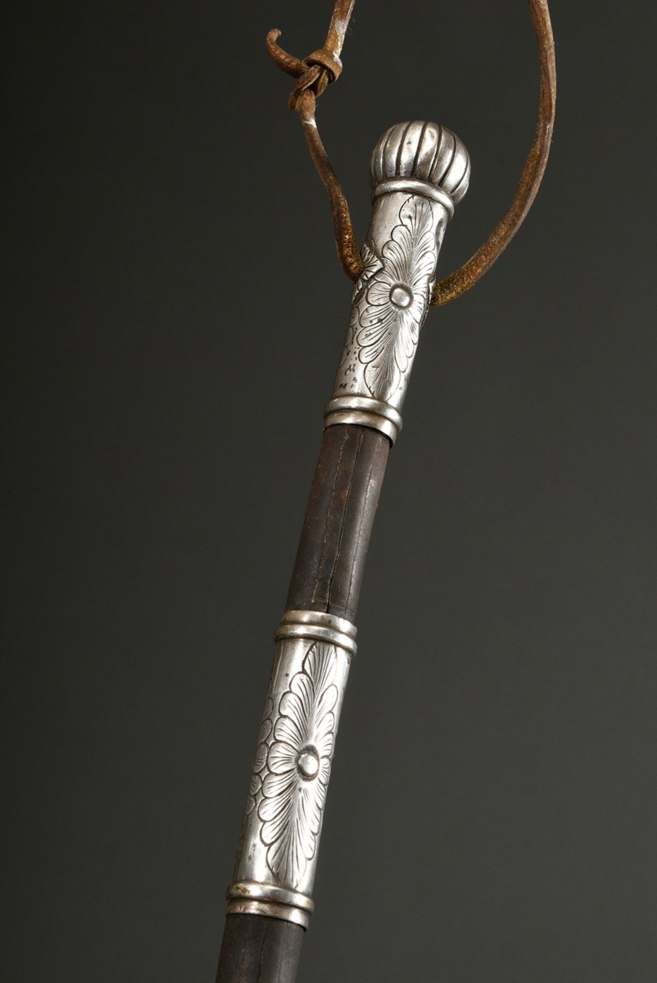 South American gaucho whip so-called Rebenque, leather with florally embossed silver cuffs and hand