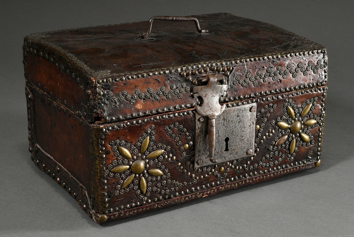 Antique leather casket with nailed decoration on the body and steel fittings, inside florally hallm
