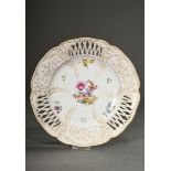 KPM plate with polychrome house painting "Flowers" and rich gold staffage on a six-lobed rim and ri