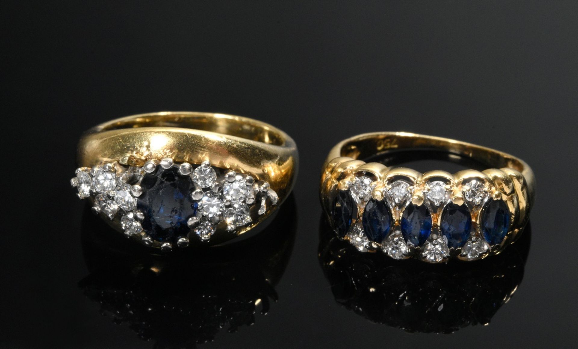 2 Diverse Gelbgold Ringe: 1 mit Saphir und Brillanten (zus. ca. 0.42ct/VS-SI/W,7,3g, Gr. 51) und 1 