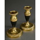 Pair of low Empire candlesticks in gilt bronze with blackened balusters and fine ornamental friezes