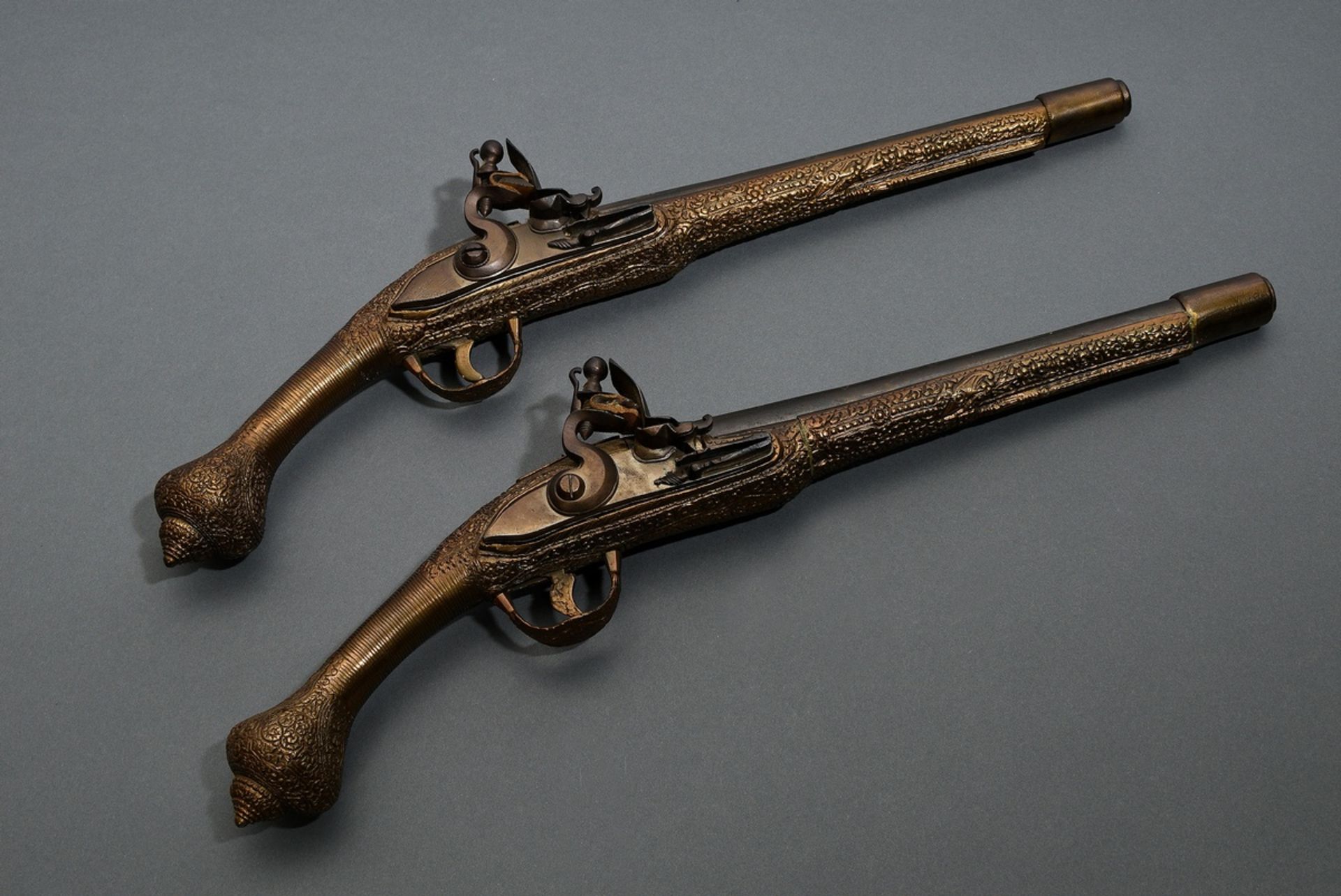 2 Ottoman muzzle loading flintlock pistols, smooth bore with engraved brass overlay, calibre 14mm, 
