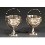 A pair of Berlin Empire sugar baskets with filigree latticework and hemispherical inserts on a roun