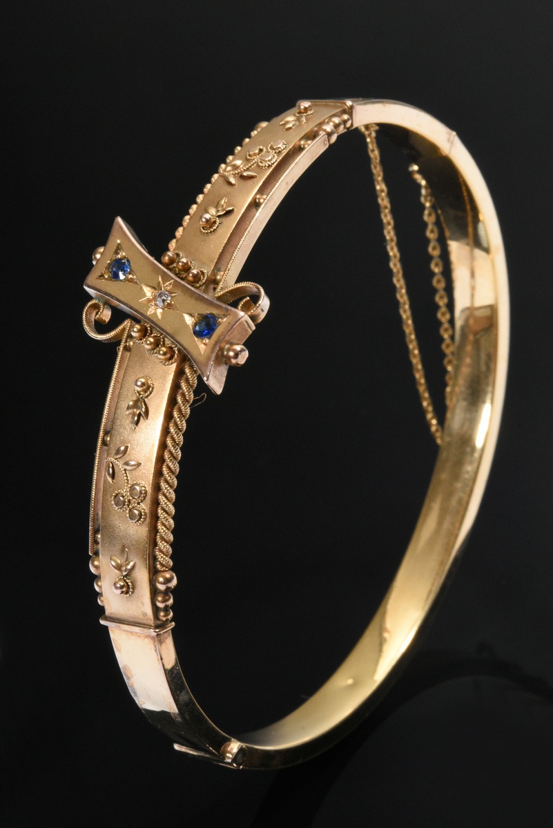 Oval English yellow gold 375 bangle with floral ornamentation and small diamond rose (approx. 0.01c