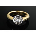 Yellow gold 750 ring with brilliant-cut diamond solitaire (approx. 1.10ct/VVS/W) set in platinum, 1