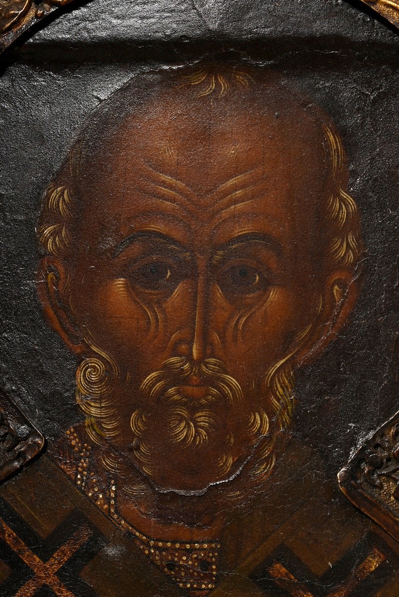 Russian icon "Saint Nicholas" under a florally embossed brass oklad, egg tempera/chalk ground on wo - Image 3 of 10