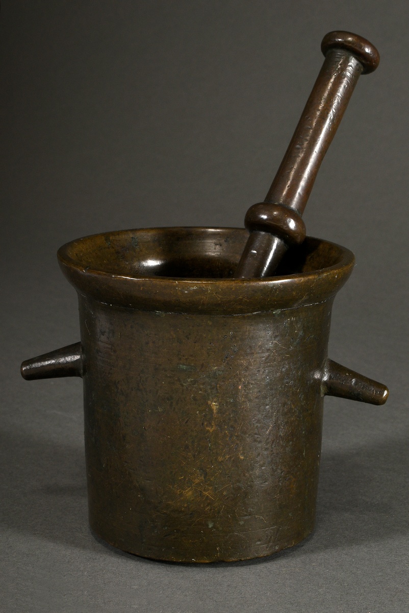 Archaic mortar with two downward-pointing rod-shaped handles and pestle, 17th century, h. 14cm, Ø 1