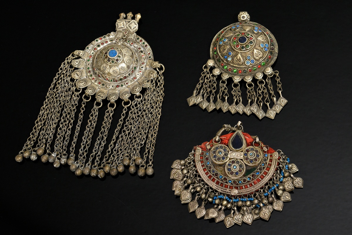 3 Various Afghan pendants: 1 mounted on fabric with stones, beads and bells and 2 domed discs with 