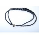 KETTE zweireihig, schwarze facettierte Perlen, D 5-15mm, Steckverschluss besetzt mit weiterer Perle