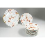 Limoges cake service, designed by Andre Godin, France. Consisting of: Cake plate (D 26cm) and 12 ca