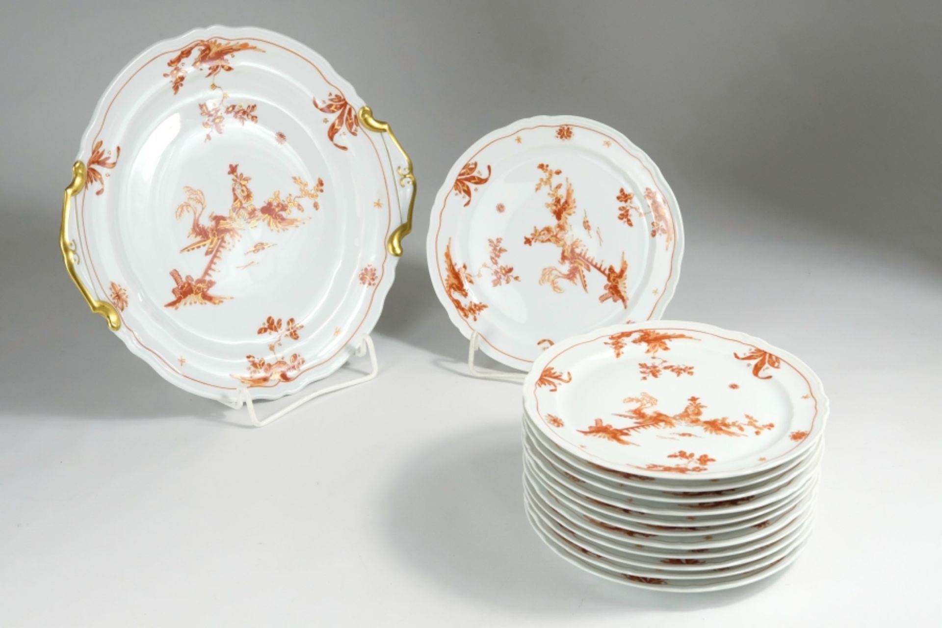 Limoges cake service, designed by Andre Godin, France. Consisting of: Cake plate (D 26cm) and 12 ca