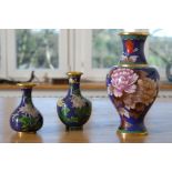 Japanese cloisonné vases, three blue enamel vases. Decorated with floral motifs. Gilt interior, gol