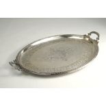 Tray with engraved oriental pattern, silver-plated. Oval with handles on the sides. Four feet on th