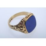 Signet ring with unengraved lapis lazuli plate (1.5x1.5cm), the sides decorated with floral motifs,