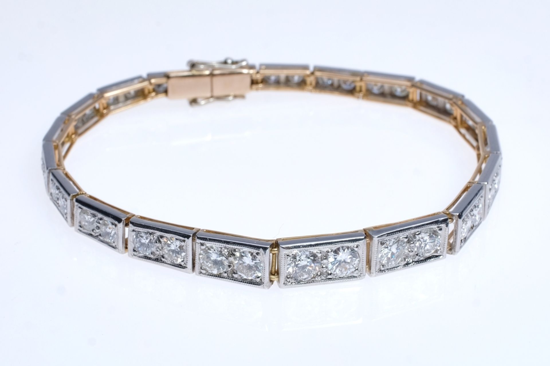 Bracelet, curved shape, 20 rectangular links, set with a total of 40 brilliant-cut diamonds (one br