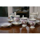 Five small espresso cups, Ginori, each with painted medallion, blue vine and gold decoration