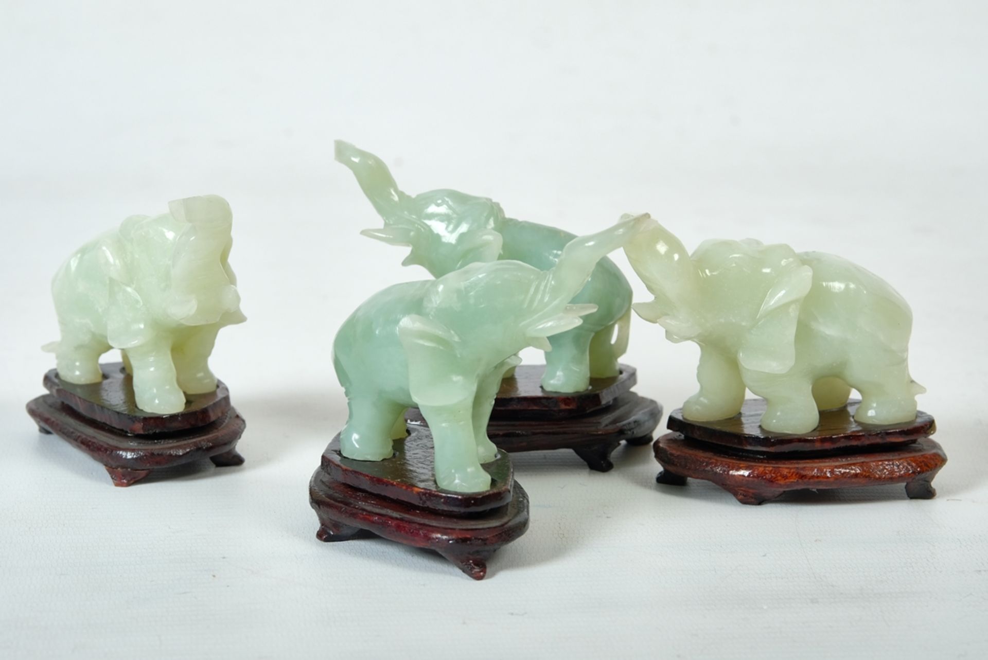 Jade elephants,four pieces, China. One elephant chipped.