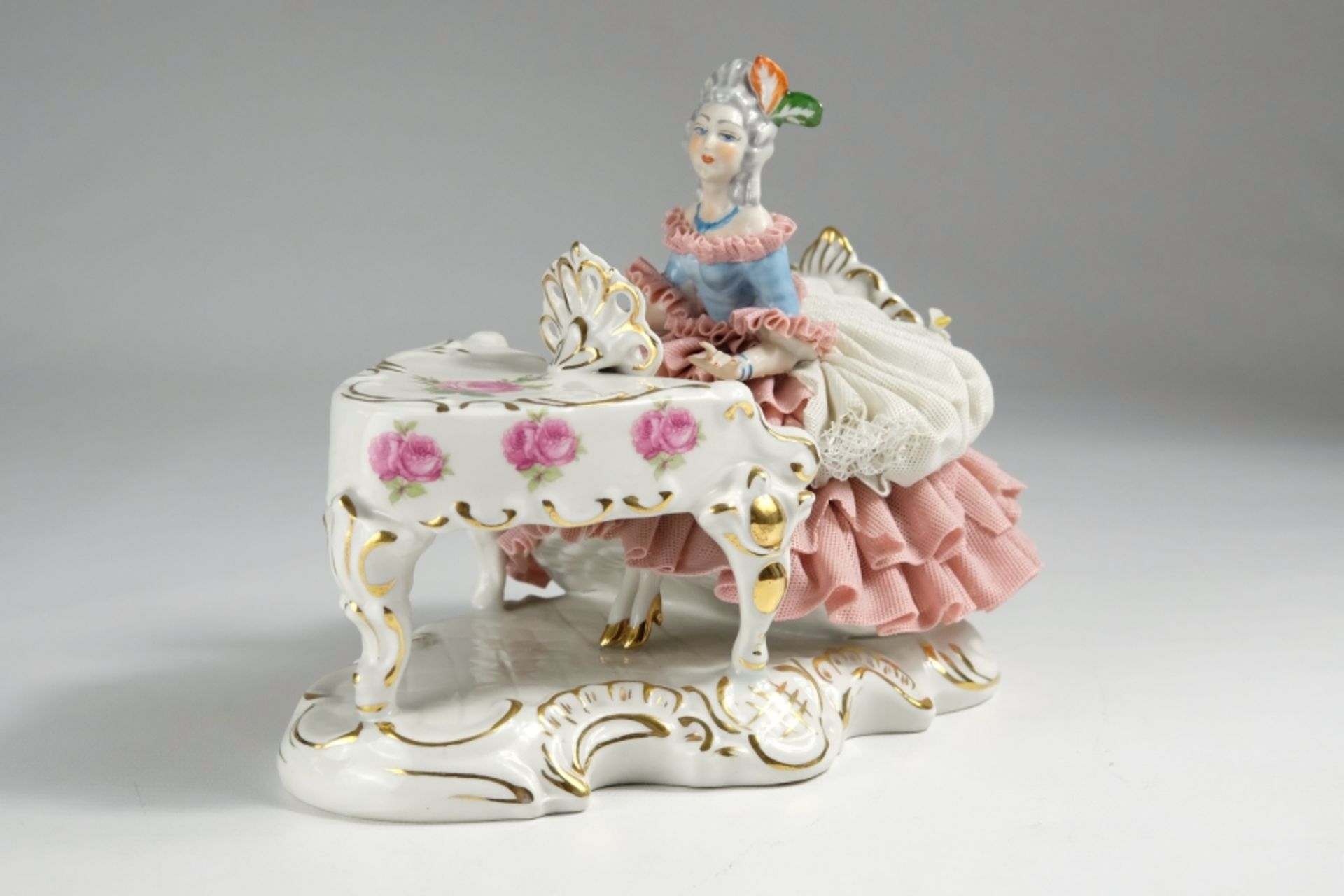 Porcelain figure, lady with a sweeping tulle dress on a wing, painted with roses.  - Image 4 of 5