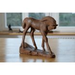 Filly figure made of brown clay, in the style of Karlsruhe majolica. 