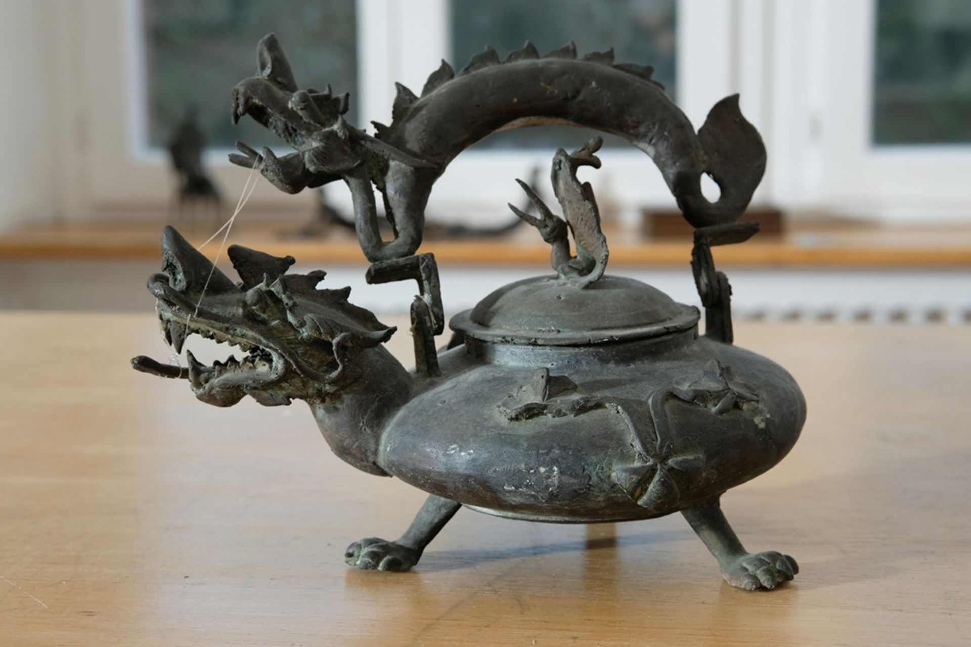 Dragon-shaped tea kettle with tripod stand.  - Image 2 of 4