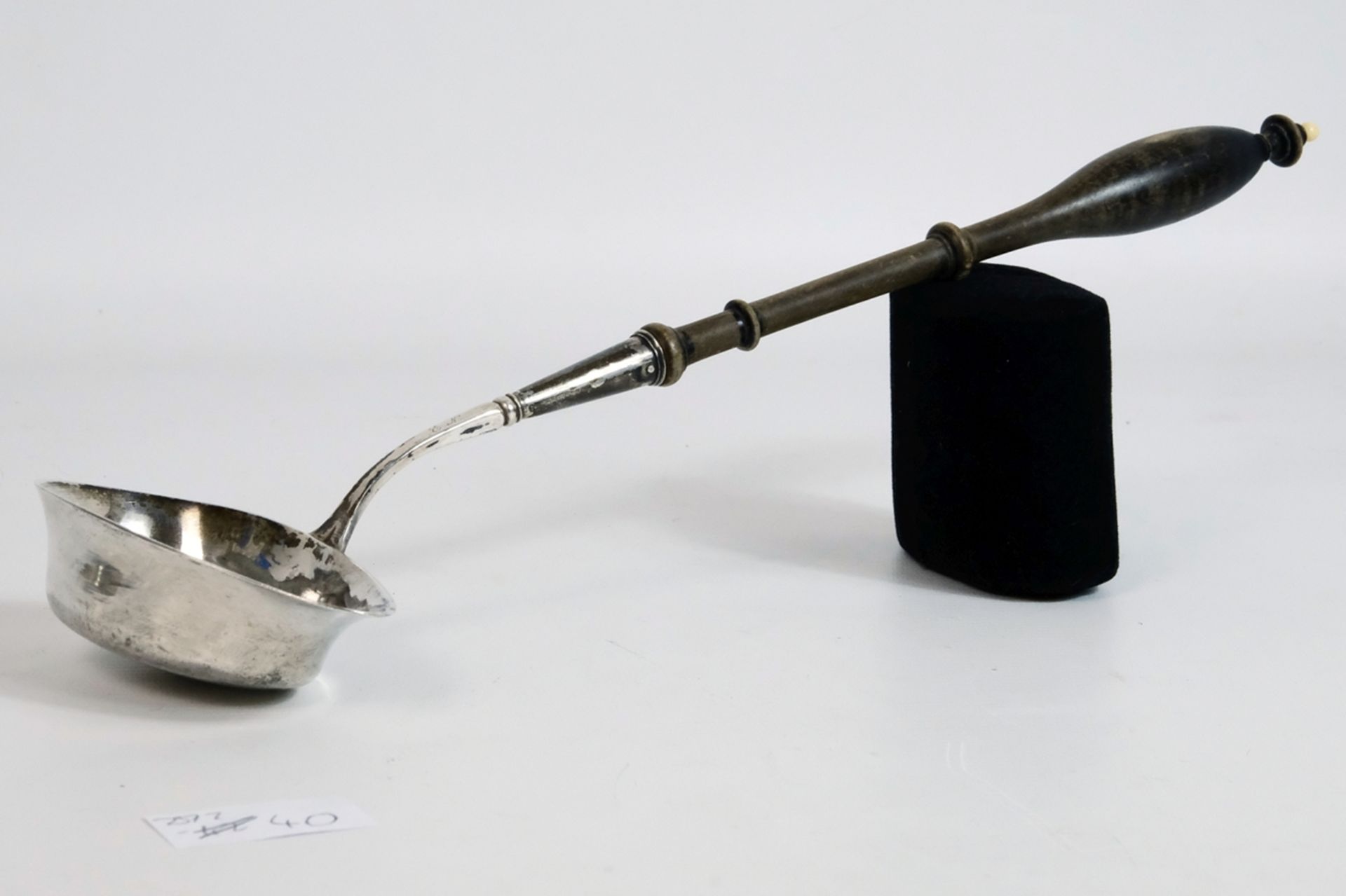 Bowl ladle, with ebonised turned wooden handle ending in a small bone ball at the top, 19th century