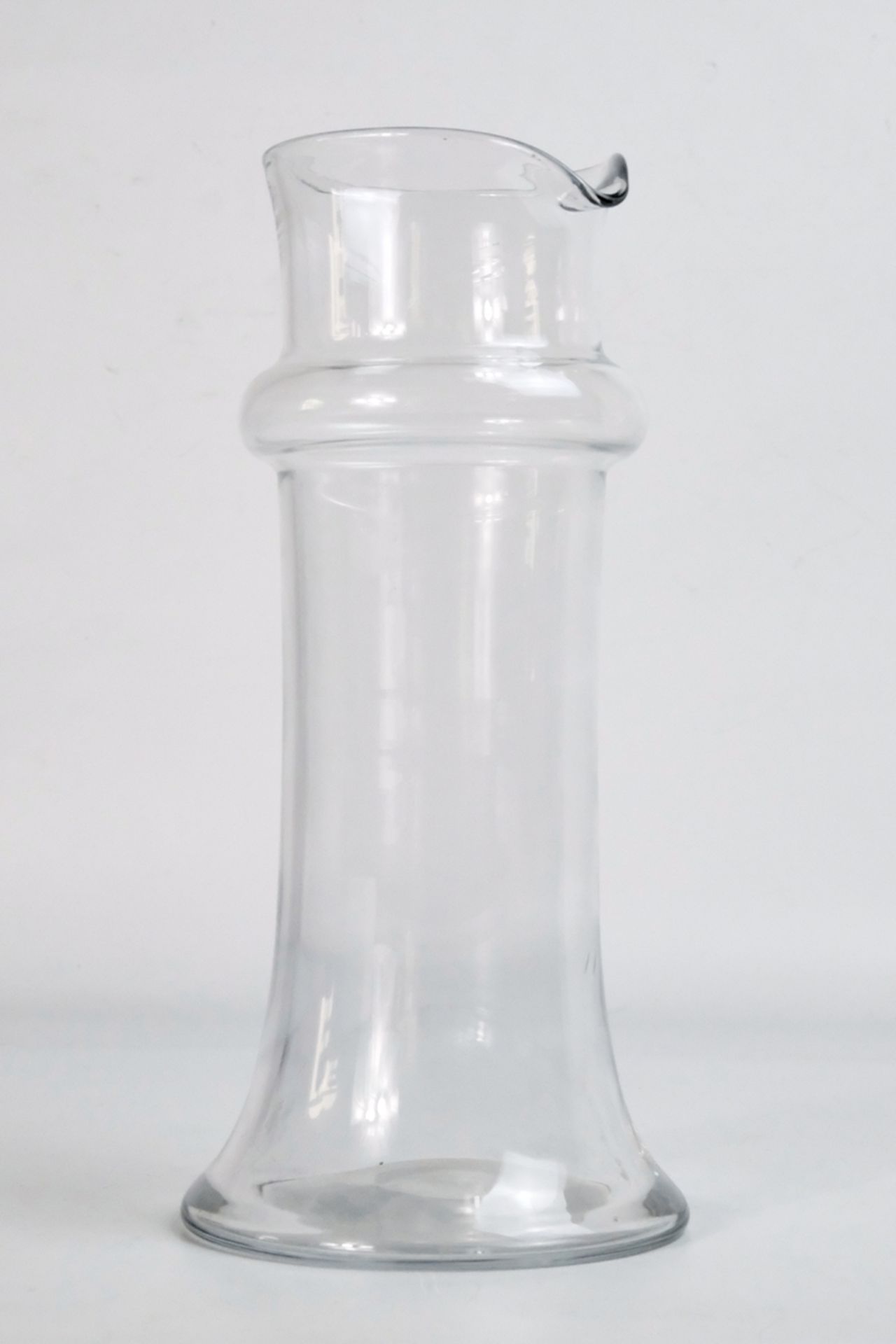 Handleless carafe, blown glass. Neck ring, wide base, cut out.