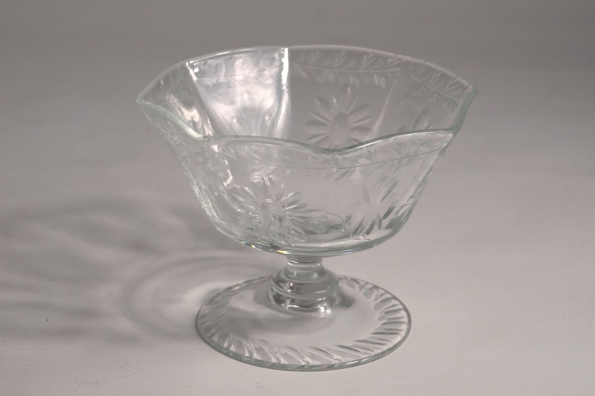 An antique sweet or dessert bowl. Colourless glass, cut. 