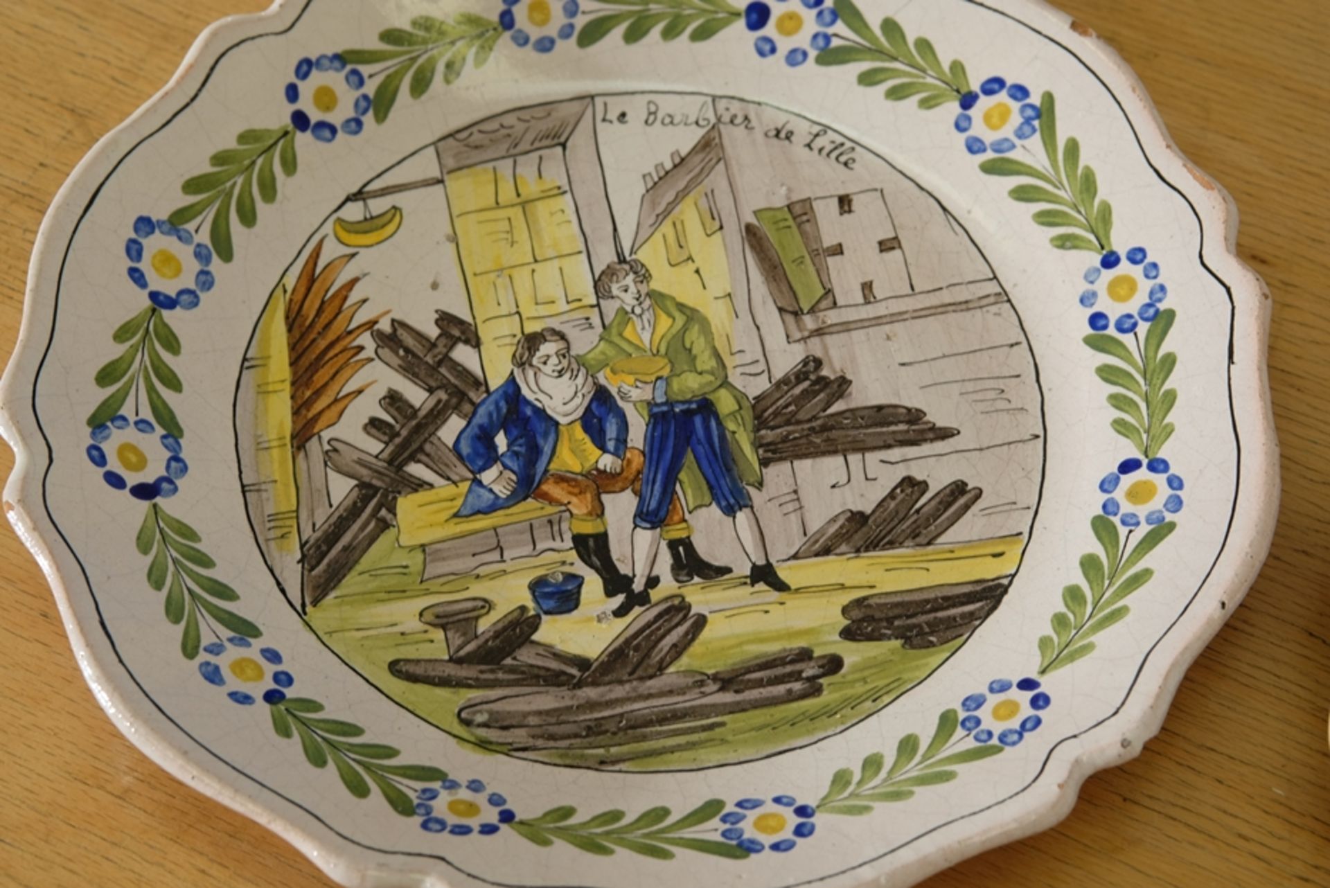 Two antique clay plates, curved shape, painted in the centre, floral decoration on the rim. - Image 3 of 4