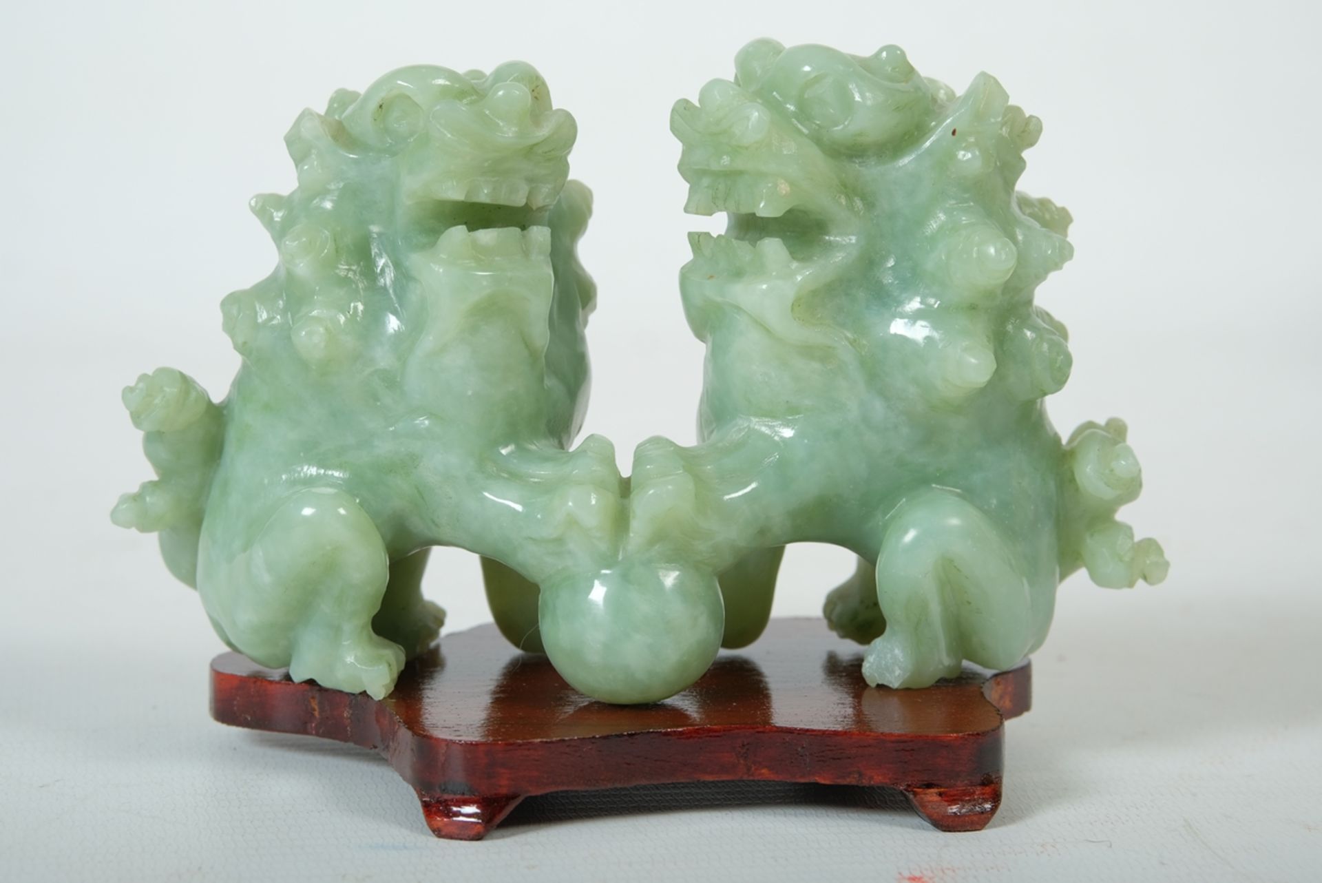 Guardian lions made of jade, China, with base
