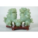 Guardian lions made of jade, China, with base