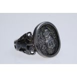 Ring with figure of a saint, possibly St Christopher, vegetal design on the side, size 61, silver 1