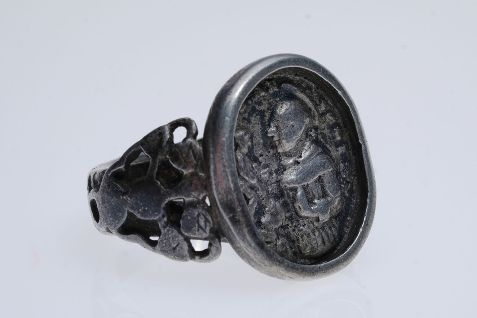 Ring with figure of a saint, possibly St Christopher, vegetal design on the side, size 61, silver 1