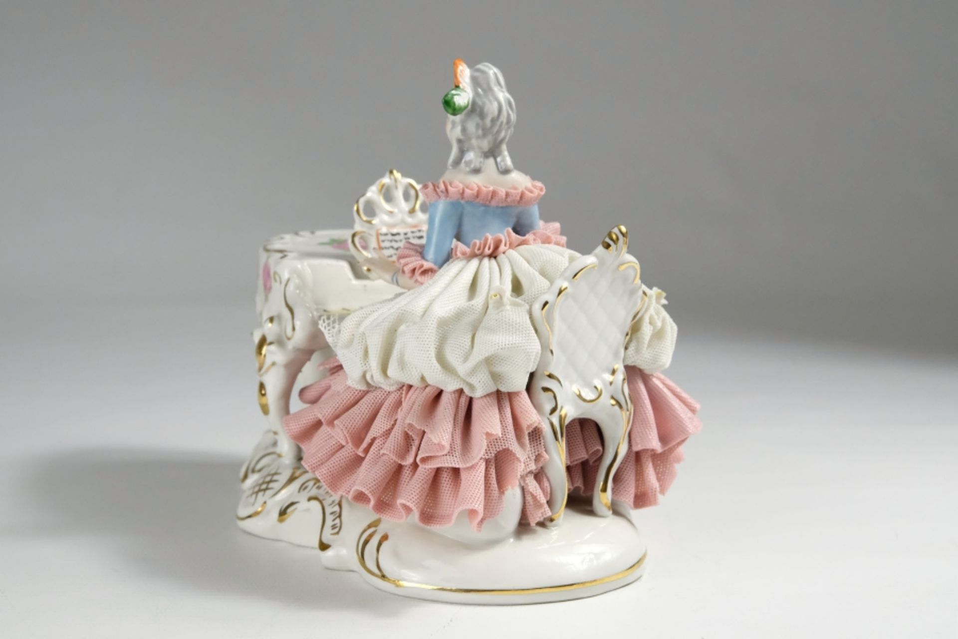 Porcelain figure, lady with a sweeping tulle dress on a wing, painted with roses.  - Image 3 of 5