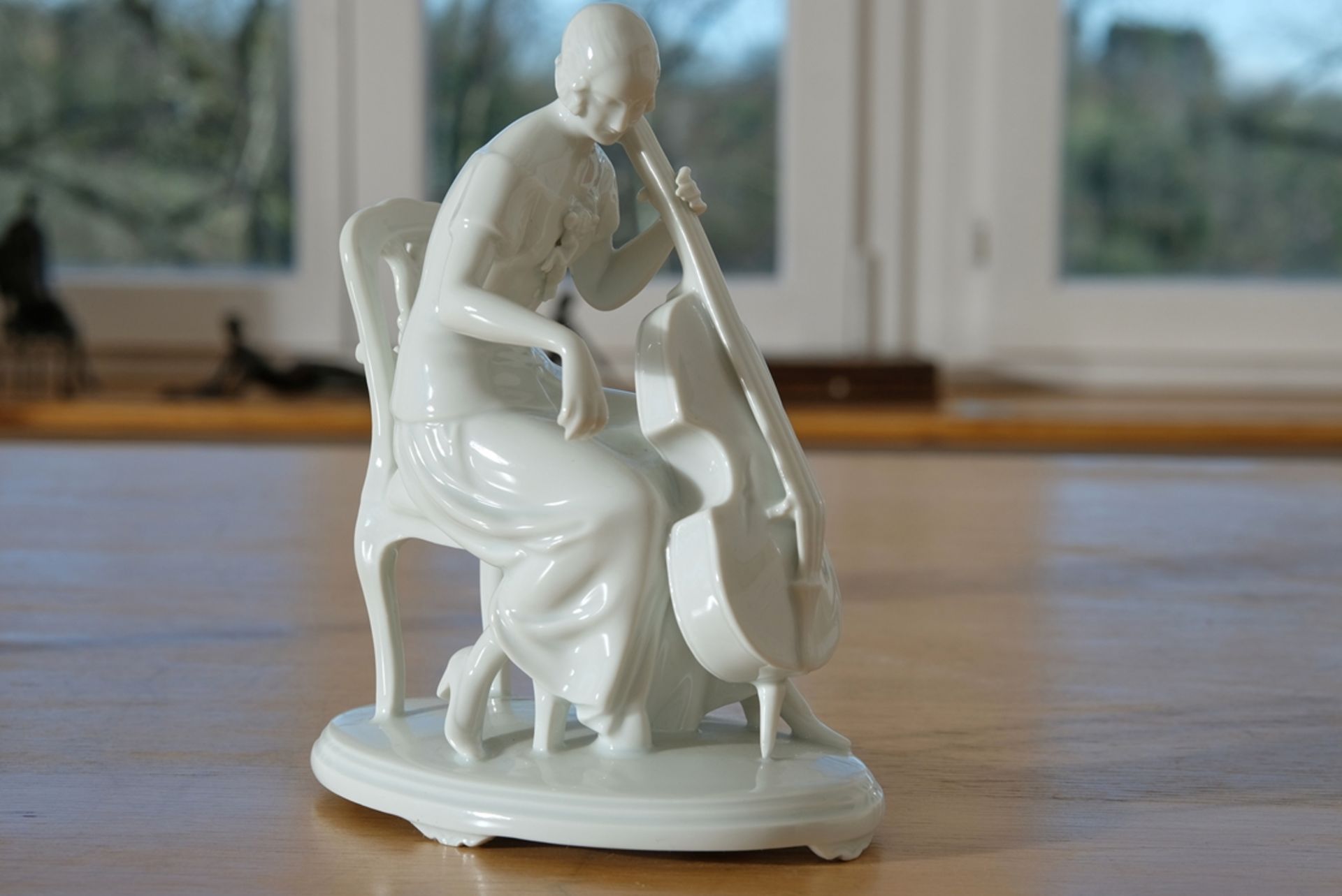 Porcelain figure Cello player, Augarten Vienna, cello bow missing, 20 cm high - Image 2 of 4