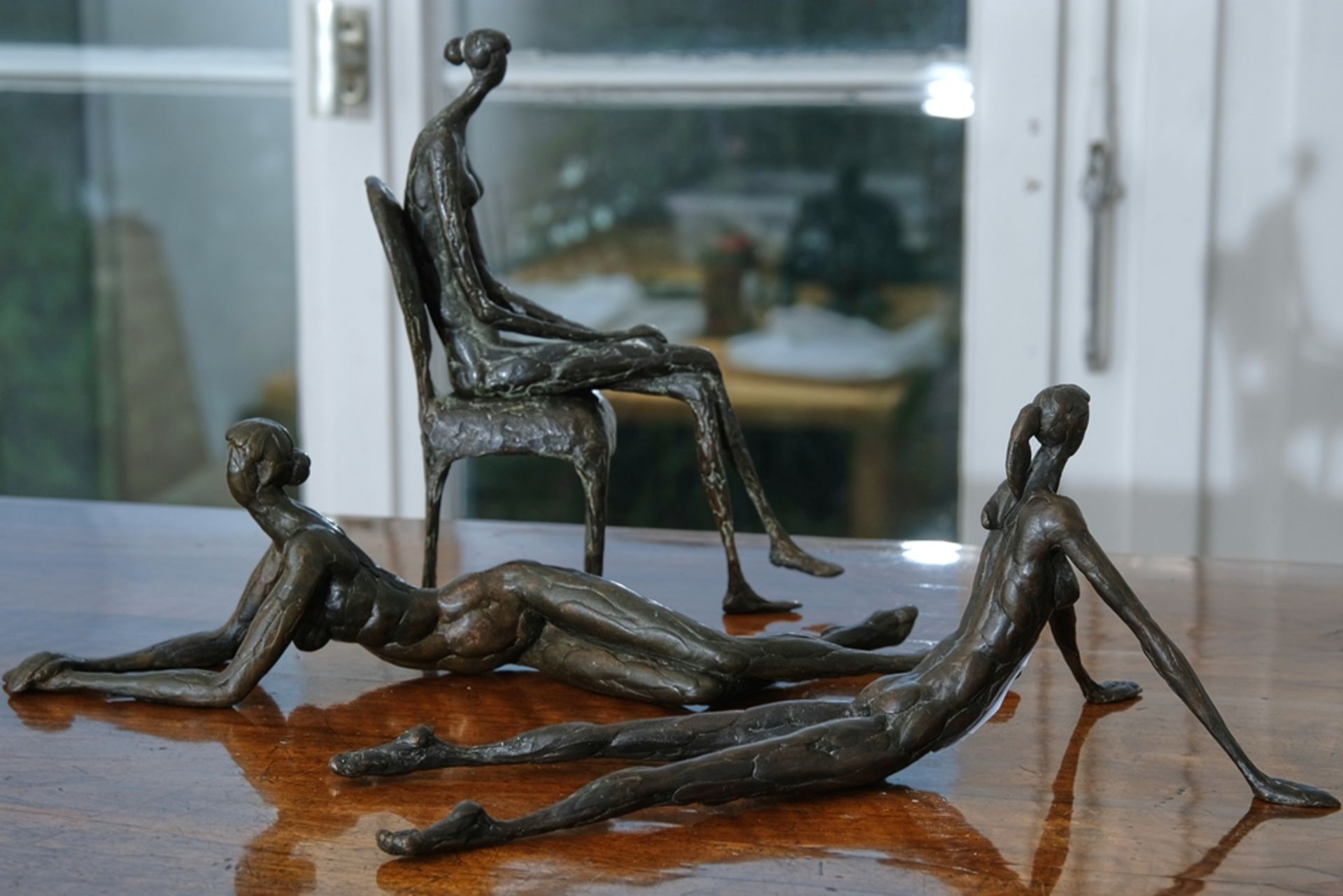 Martin, Roland (born 1927) Three female nudes; bronze sculptures.