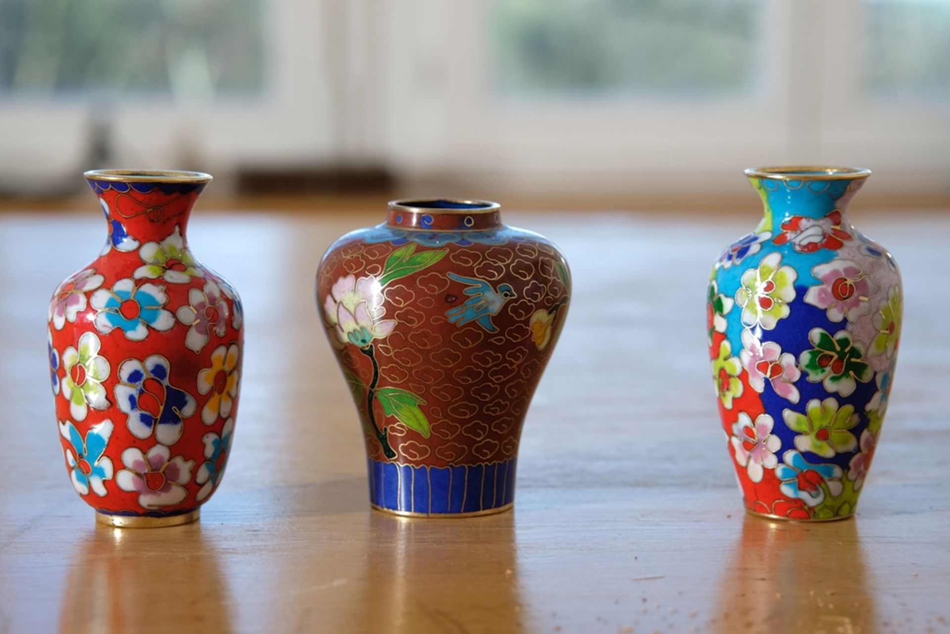 Japanese cloisonné vases, three miniature enamel vases, different colours.