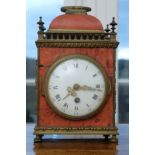 Travelling clock, movement marked "Paris 1900", red tortoiseshell. Inlaid sheet with owner's note: 