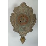 Wall clock with brass dial and angel decorations.