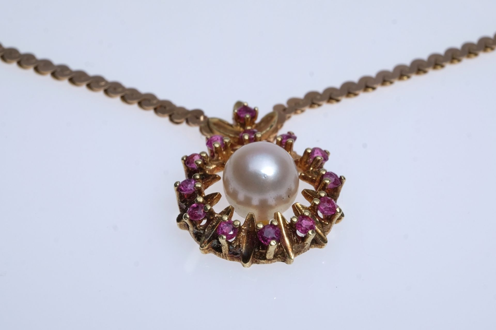 Collier with pendant, set with cultured pearl and wreath of genuine rubies, all tested, chain and s - Image 2 of 3