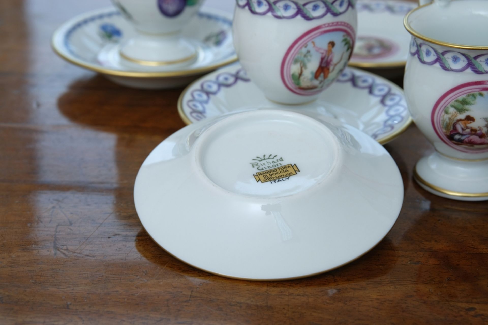 Five small espresso cups, Ginori, each with painted medallion, blue vine and gold decoration - Image 5 of 6