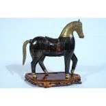 Unknown (20th century) Horse made of wood, horn and brass. 